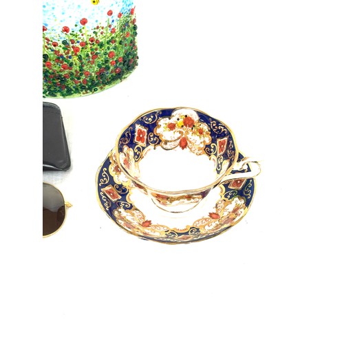 130 - Selection of collectables includes poppy scene glass, Coalport lady, cup and saucer etc