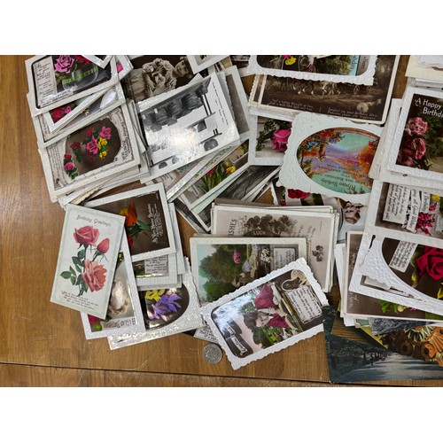 126 - Large selection of vintage and later postcards