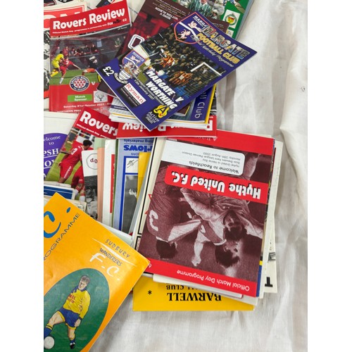 189 - Large selection of vintage and later football programmes includes Rovers Review, Ashford town etc