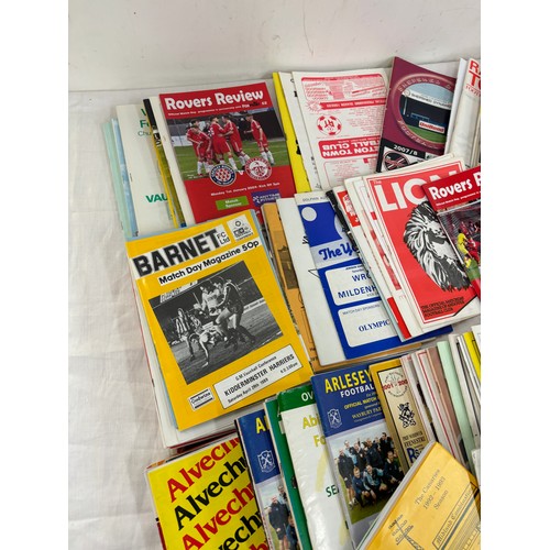 189 - Large selection of vintage and later football programmes includes Rovers Review, Ashford town etc