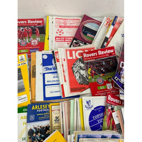 189 - Large selection of vintage and later football programmes includes Rovers Review, Ashford town etc