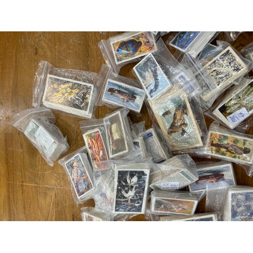 99 - Large selection of vintage cigarette cards includes Disney etc