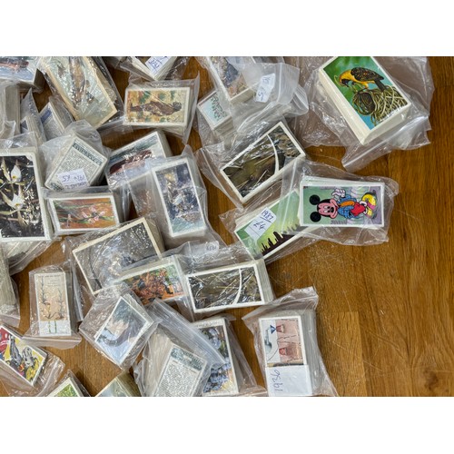 99 - Large selection of vintage cigarette cards includes Disney etc