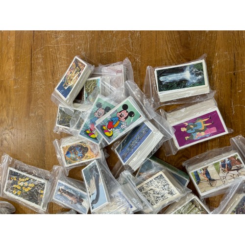 99 - Large selection of vintage cigarette cards includes Disney etc