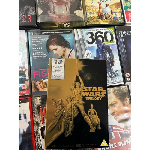 253 - Large selection of assorted DVDS and CDS to include various genres and artists