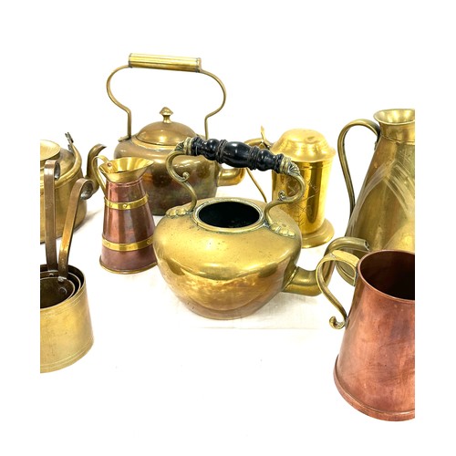 133A - Selection of brass kettles and jugs some copper