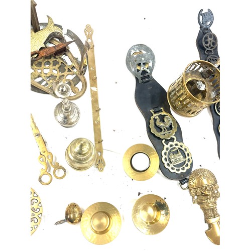 179 - Large selection of brass items to include napkin rings, salt shaker, candle holders etc