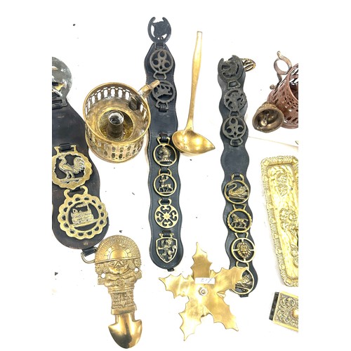 179 - Large selection of brass items to include napkin rings, salt shaker, candle holders etc