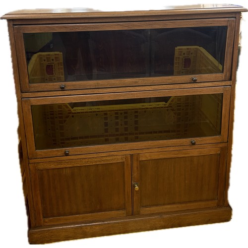 325 - Mahogany glass fronted bookcase measures approximately 45 inches tall x 42 wide and 12 deep