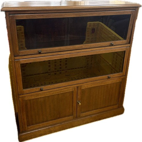 325 - Mahogany glass fronted bookcase measures approximately 45 inches tall x 42 wide and 12 deep