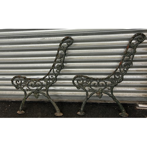 299 - Two victorian cast iron bench ends measures approximately 32 inches tall x 24 deep