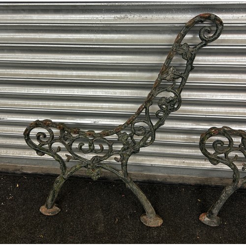 299 - Two victorian cast iron bench ends measures approximately 32 inches tall x 24 deep