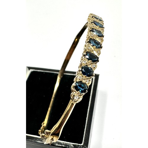 189 - 9ct gold sapphire & diamond bangle weight 8.4g