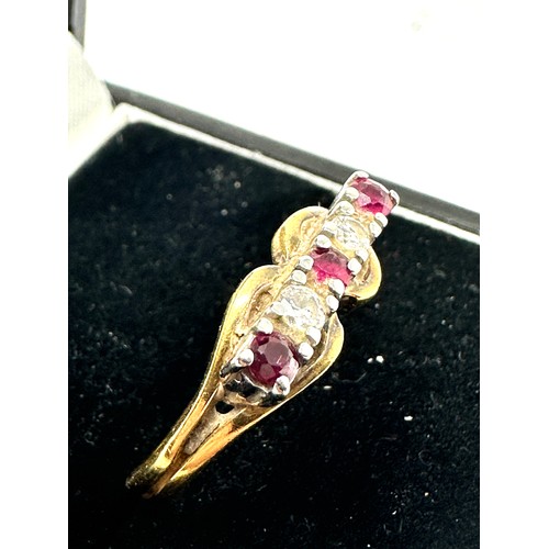 180 - 18ct gold diamond & ruby ring weight 2.54g