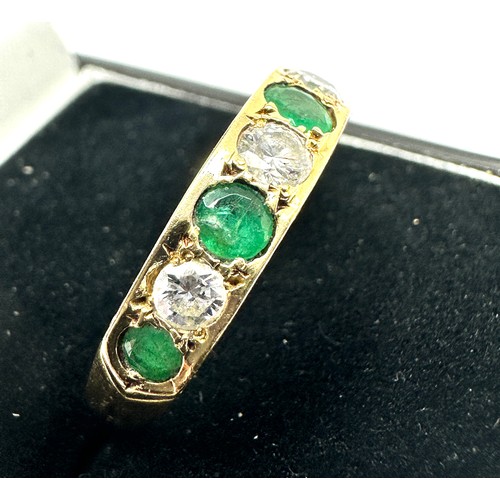 172 - 18ct gold diamond & emerald ring weight 3.5g