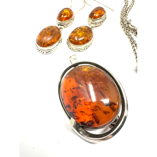 211 - selection of silver & amber jewellery includes pendant earrings etc weight 50g