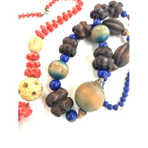 471 - Two vintage wooden costume jewellery necklaces