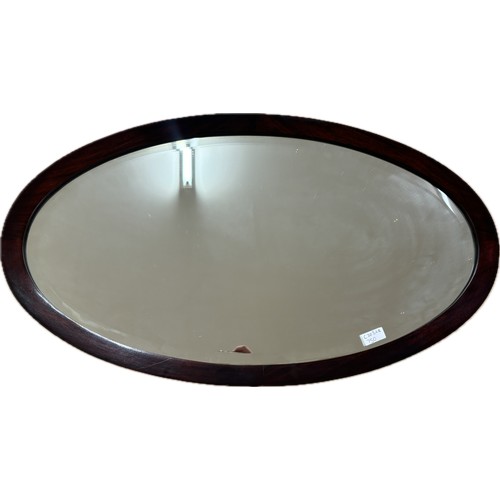 292A - Vintage oval mantle mirror measures approximately 32 inches by 18 inches