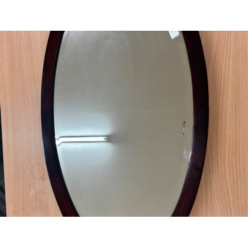 292A - Vintage oval mantle mirror measures approximately 32 inches by 18 inches