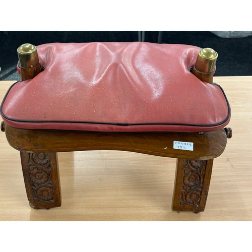 181 - Vintage carved camel saddle measures approximately 15 inches by 19 inches