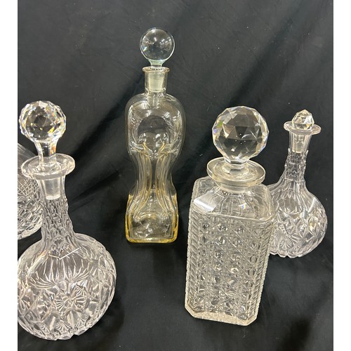 526 - Selection of glass decanters some stoppers