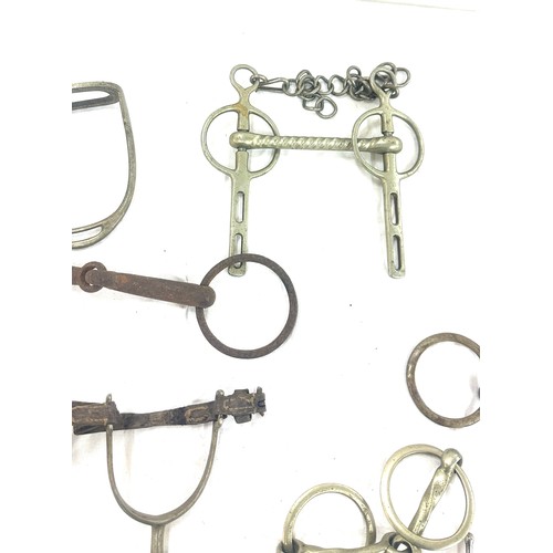 61 - Selection of metal horse bites and two foot rests