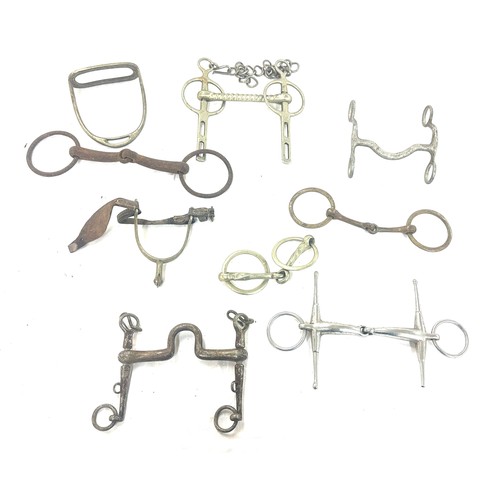 61 - Selection of metal horse bites and two foot rests