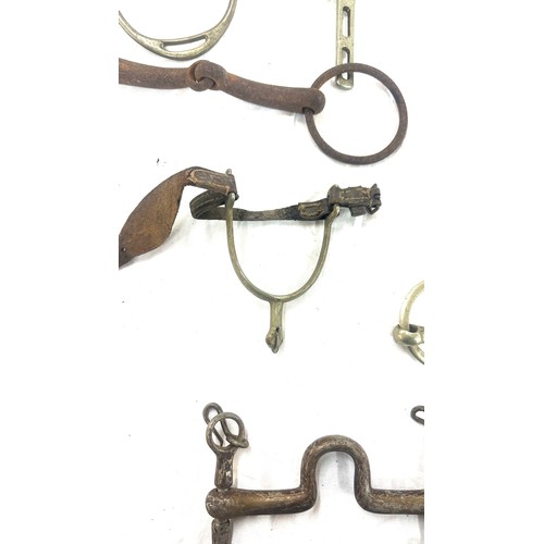 61 - Selection of metal horse bites and two foot rests