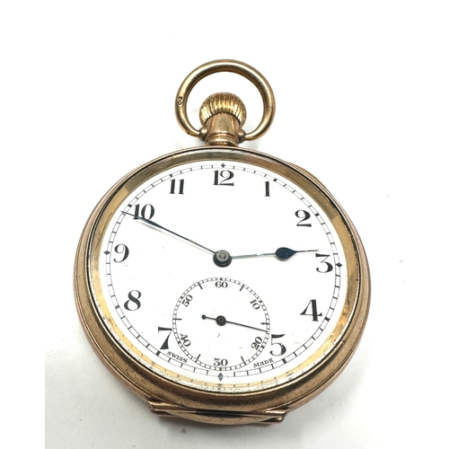 486 - Gold plated open face pocket watch the watch is ticking the case is 20 year guaranteed