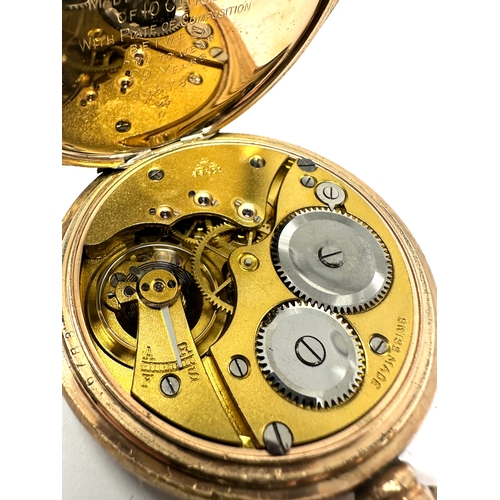 486 - Gold plated open face pocket watch the watch is ticking the case is 20 year guaranteed