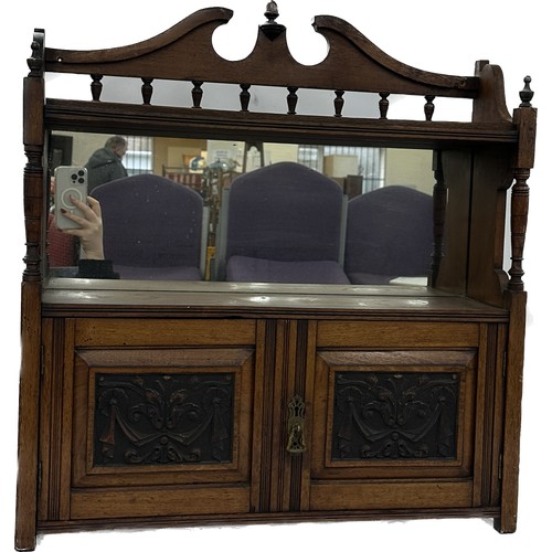 332 - Late Victorian walnut wall mounted shelf with mirror and carved panel doors measures approximately 2... 