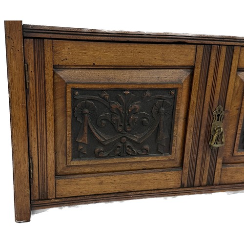 332 - Late Victorian walnut wall mounted shelf with mirror and carved panel doors measures approximately 2... 