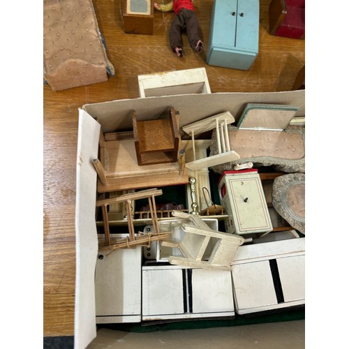 234 - Circa 1930a Triang Dolls house with later 50s/70s furniture