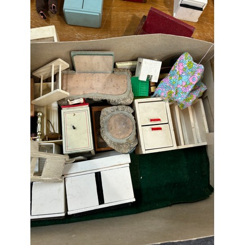 234 - Circa 1930a Triang Dolls house with later 50s/70s furniture