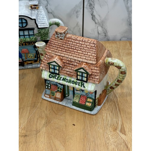 54 - Selection of three novelty Tea pots The Village by Annie Rowe