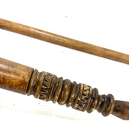 289 - Ceremonial carved wood club, throwing club and a coconut cutting tool