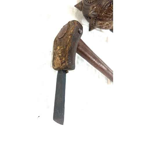 289 - Ceremonial carved wood club, throwing club and a coconut cutting tool