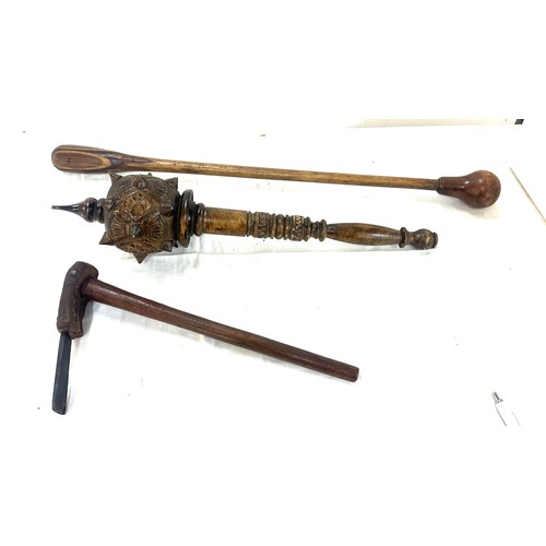 289 - Ceremonial carved wood club, throwing club and a coconut cutting tool