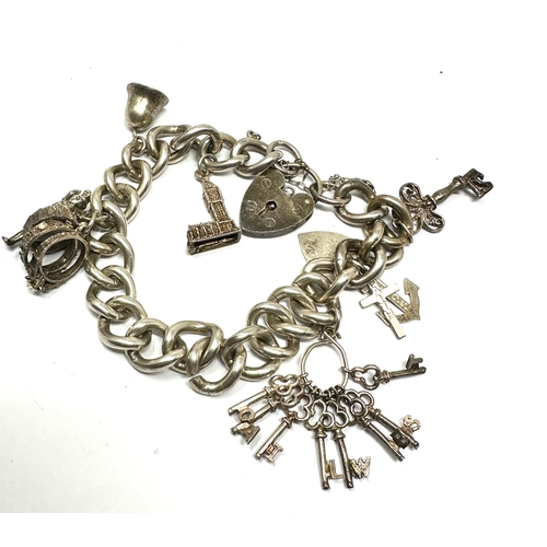 242 - Vintage silver charm bracelet & charms weight 53g