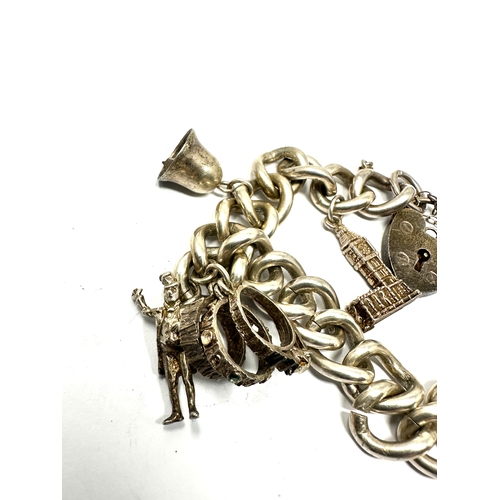 242 - Vintage silver charm bracelet & charms weight 53g