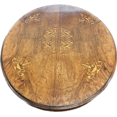 321 - Victorian walnut inlaid loo table measures approximately Length 47 inches, Width 21 inches, Height 2... 