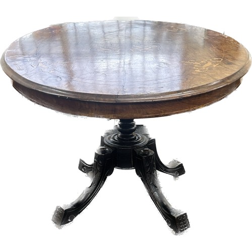 321 - Victorian walnut inlaid loo table measures approximately Length 47 inches, Width 21 inches, Height 2... 