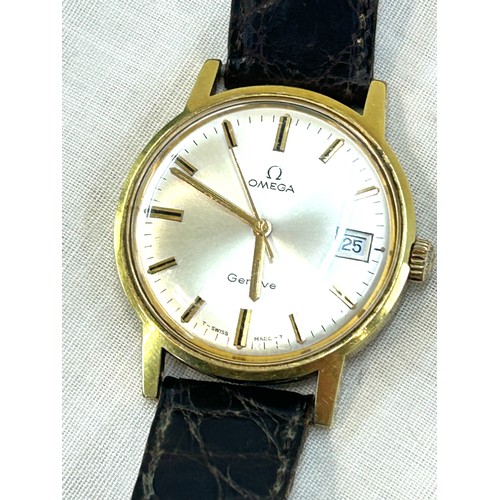 444 - Gents 9ct gold Omega Geneve wristwatch, in working order, with leather strap