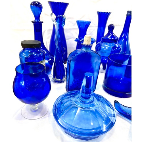 123 - Selection of blue glass vases, trinkets, bottles etc, tallest piece measures approximately 11 inches