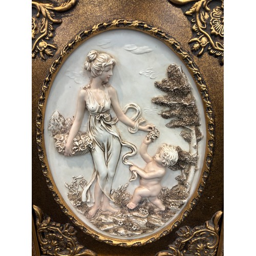 97 - Gilded frame plastic picture of mother and child, approximate frame measurements: 24 x 19.5 inches