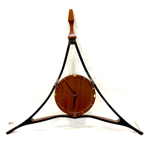 89 - Vintage wooden triangle retro wall clock, small split to wood at the back, as seen in image, approxi... 