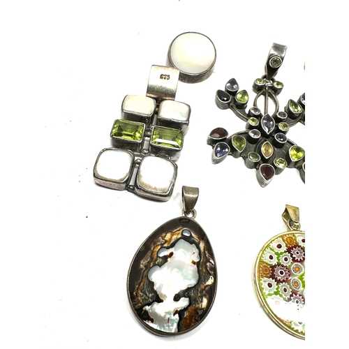 255 - selection of silver & stone set pendants weight 68g