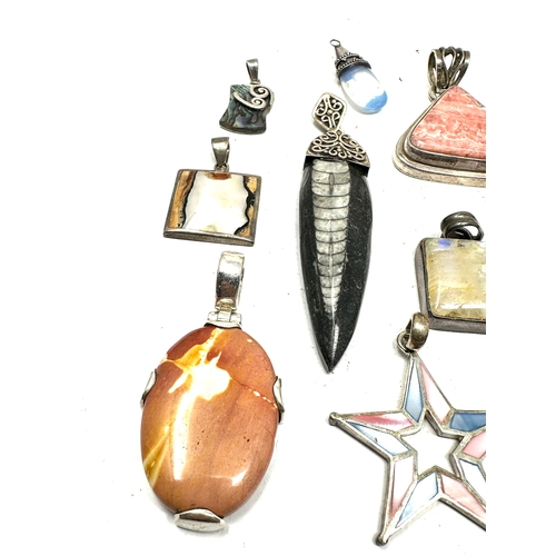 262 - selection of silver & stone set pendants weight 115g