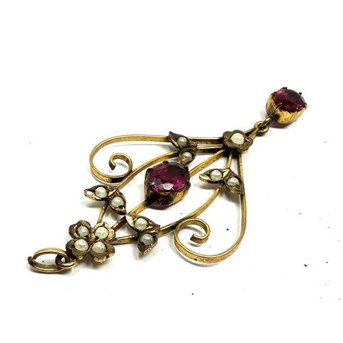 142 - Antique 9ct gold pendant set with pink gemstones & seed pearls measures approx 5.6cm drop weight 2.4... 