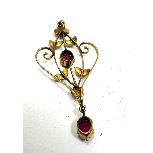 142 - Antique 9ct gold pendant set with pink gemstones & seed pearls measures approx 5.6cm drop weight 2.4... 